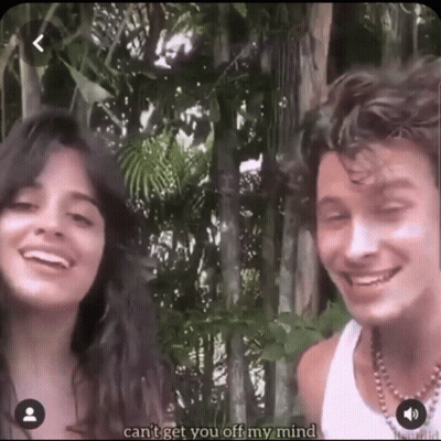 A Man And A Woman Are Smiling In Front Of Trees And The Man Says " Can 'T Get You Off My Mind " GIF