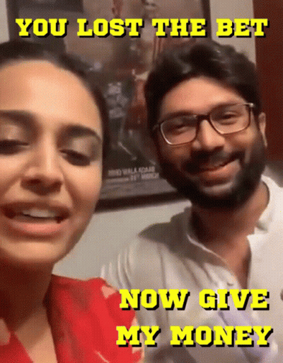 A Man And A Woman Are Smiling With The Words You Lost The Bet Now Give My Money GIF