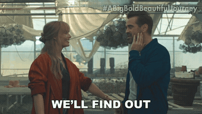A Man And A Woman Are Standing In A Greenhouse And The Woman Is Saying We 'Ll Find Out GIF
