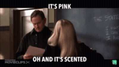 A Man And A Woman Are Standing In Front Of A Chalkboard That Says The State GIF