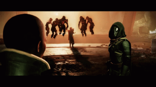 A Man And A Woman Are Standing In Front Of A Group Of People GIF