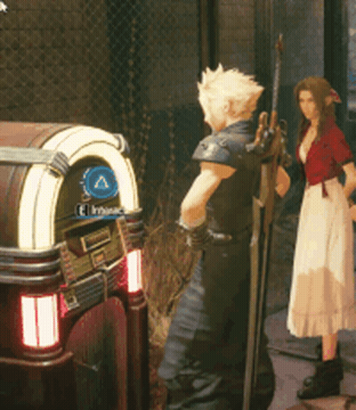 A Man And A Woman Are Standing In Front Of A Jukebox That Says " El Principe " On It GIF