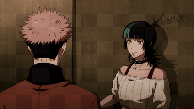 A Man And A Woman Are Standing In Front Of A Wall With Graffiti On It That Says Rocket GIF