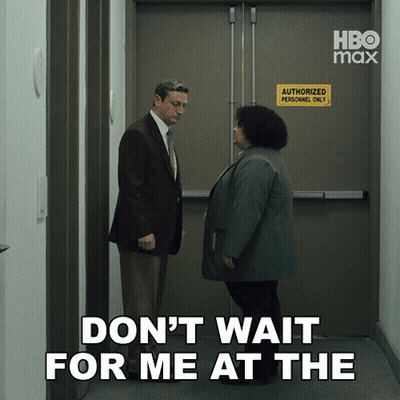 A Man And A Woman Are Standing In Front Of An Authorized Personnel Only Door GIF