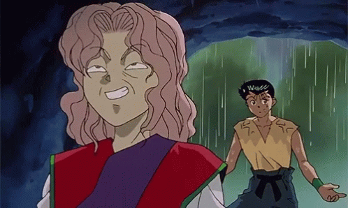 A Man And A Woman Are Standing In The Rain And The Woman Is Making A Funny Face GIF