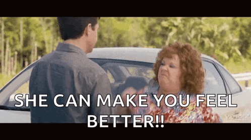 A Man And A Woman Are Standing Next To A Car And The Woman Says She Can Make You Feel Better GIF