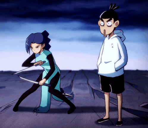 A Man And A Woman Are Standing Next To Each Other GIF
