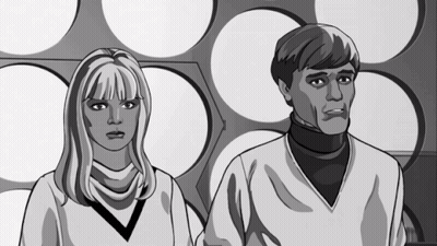 A Man And A Woman Are Standing Next To Each Other GIF