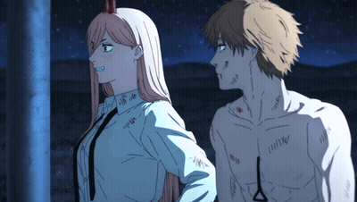 A Man And A Woman Are Standing Next To Each Other And The Man Has A Scar On His Chest GIF