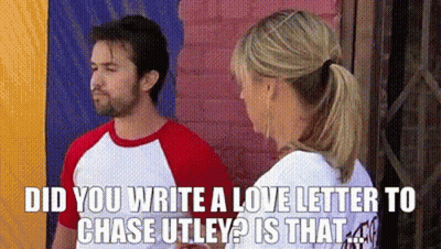 A Man And A Woman Are Standing Next To Each Other And The Man Is Asking The Woman If She Wrote A Love Letter GIF