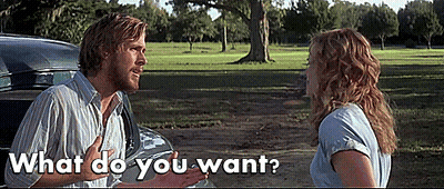 A Man And A Woman Are Standing Next To Each Other And The Man Is Pointing At The Woman And Asking What Do You Want GIF
