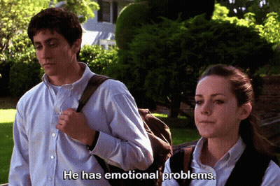 A Man And A Woman Are Standing Next To Each Other And The Man Is Saying He Has Emotional Problems GIF
