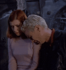 Man And Woman Standing Next To Each Other GIF