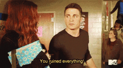 A Man And A Woman Are Standing Next To Each Other And The Man Is Saying You Ruined Everything GIF