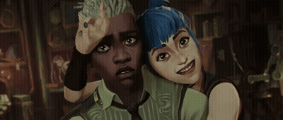 A Man And A Woman Are Standing Next To Each Other And The Man Is Wearing A Green Shirt With The Number 12 On The Front GIF