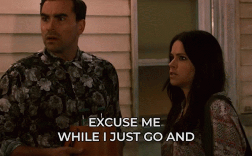 A Man And A Woman Are Standing Next To Each Other And The Man Says Excuse Me While I Just Go And GIF
