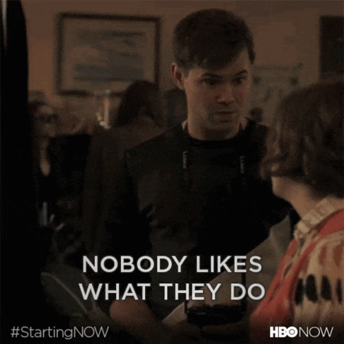 A Man And A Woman Are Standing Next To Each Other And The Man Says Nobody Likes What They Do GIF