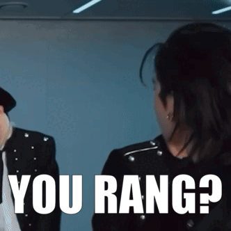 A Man And A Woman Are Standing Next To Each Other And The Woman Is Asking The Man " You Rang ? " GIF
