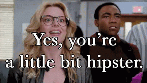 A Man And A Woman Are Standing Next To Each Other And The Woman Is Saying Yes You 'Re A Little Bit Hipster GIF