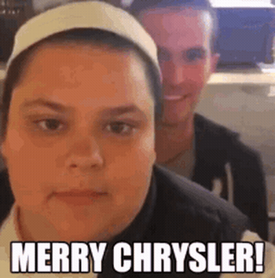 A Man And A Woman Are Standing Next To Each Other And The Woman Is Wearing A White Headband . GIF