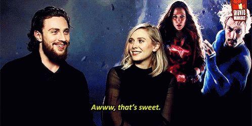 Man And Woman Standing Next To Each Other GIF