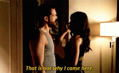 A Man And A Woman Are Standing Next To Each Other And The Woman Says That Is Not Why I Came Here GIF