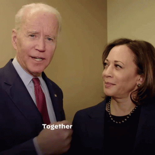 A Man And A Woman Are Standing Next To Each Other And The Word Together Is On The Screen GIF