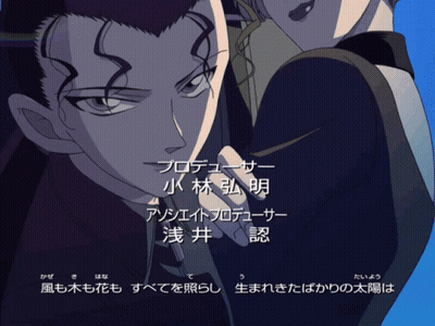 A Man And A Woman Are Standing Next To Each Other And Their Names Are Written In A Foreign Language GIF