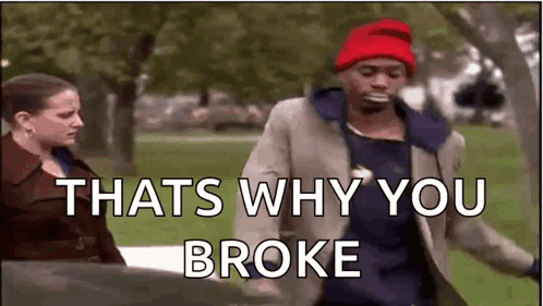 A Man And A Woman Are Standing Next To Each Other In A Park . The Man Is Wearing A Red Hat . GIF