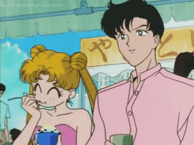 A Man And A Woman Are Standing Next To Each Other In Front Of A Sign That Says " Redfirerose Tumblr.com " On It GIF