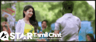 A Man And A Woman Are Standing Next To Each Other In Front Of A Sign That Says Star Tamil Chat GIF