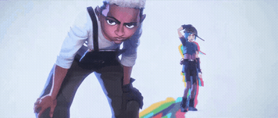 A Man And A Woman Are Standing Next To Each Other In Front Of A White Background . GIF