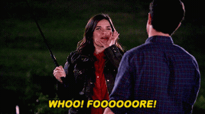 A Man And A Woman Are Standing Next To Each Other With The Woman Saying Whoo ! GIF