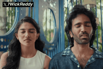 A Man And A Woman Are Standing Next To Each Other With Their Eyes Closed And A 7Wick Reddy Logo In The Corner GIF