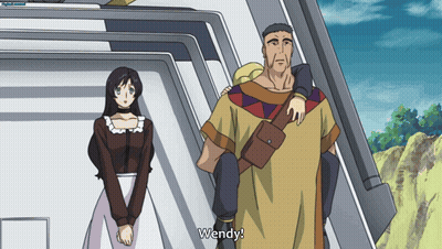 A Man And A Woman Are Standing Next To Each Other With Wendy Written On The Bottom GIF