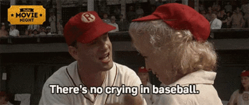A Man And A Woman Are Talking In A Baseball Field And The Woman Says There 'S No Crying In Baseball .. GIF