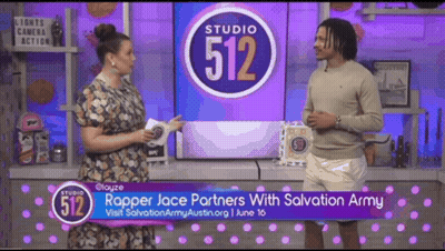 A Man And A Woman Are Talking On A Studio 512 Show GIF