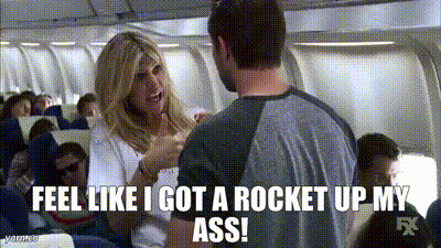 A Man And A Woman Are Talking On An Airplane And The Woman Is Saying " Feel Like I Got A Rocket Up My Ass " GIF