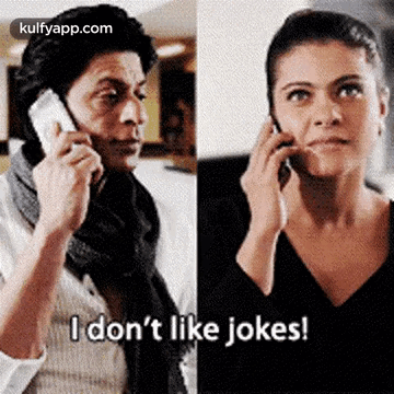A Man And A Woman Are Talking On Cell Phones And The Man Is Saying `` I Don 'T Like Jokes ! '' GIF