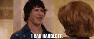 A Man And A Woman Are Talking To Each Other And The Man Is Smiling And Saying I Can Handle It . GIF