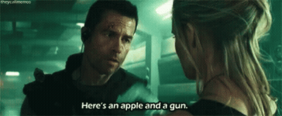 A Man And A Woman Are Talking To Each Other In A Dark Room . GIF