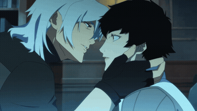 A Man And A Woman Are Touching Each Other 'S Faces GIF