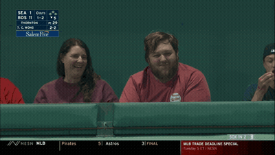 A Man And A Woman Are Watching A Baseball Game And The Man Is Saying Darn It GIF