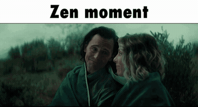 A Man And A Woman Are Wrapped In A Blanket And The Words Zen Moment Are Above Them GIF