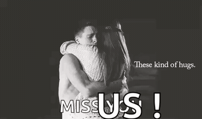 A Man And A Woman Hugging Each Other In A Black And White Photo With The Words `` These Kind Of Hugs . '' GIF