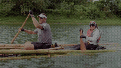 A Man And A Woman In A Raft With The Number 44 On Their Shirts GIF
