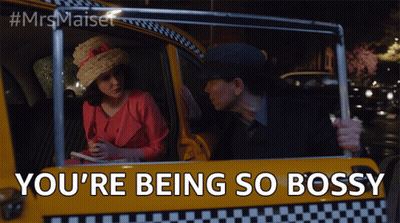A Man And A Woman In A Taxi With The Words You 'Re Being So Bossy GIF