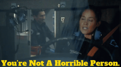 A Man And A Woman In An Ambulance With The Words You 'Re Not A Horrible Person GIF