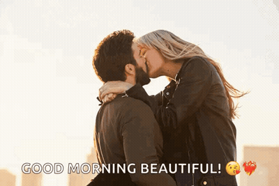 A Man And A Woman Kissing With The Words " Good Morning Beautiful " Below Them GIF
