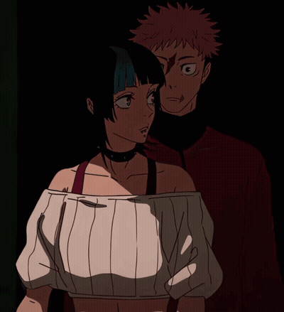 a man and a woman standing next to each other